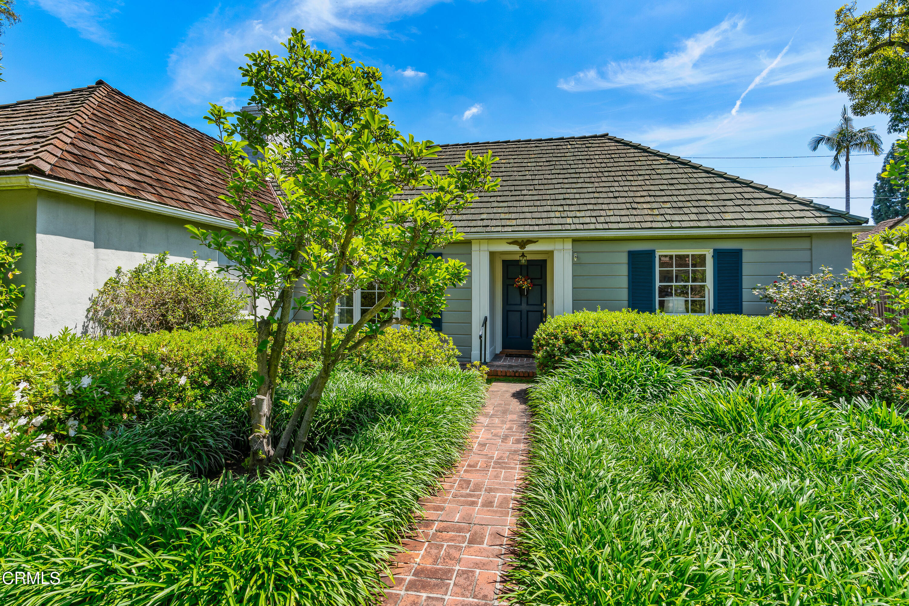 724 Winthrop Road San Marino, CA 91108 - Photo 4 of 37 a front view of a house with a yard