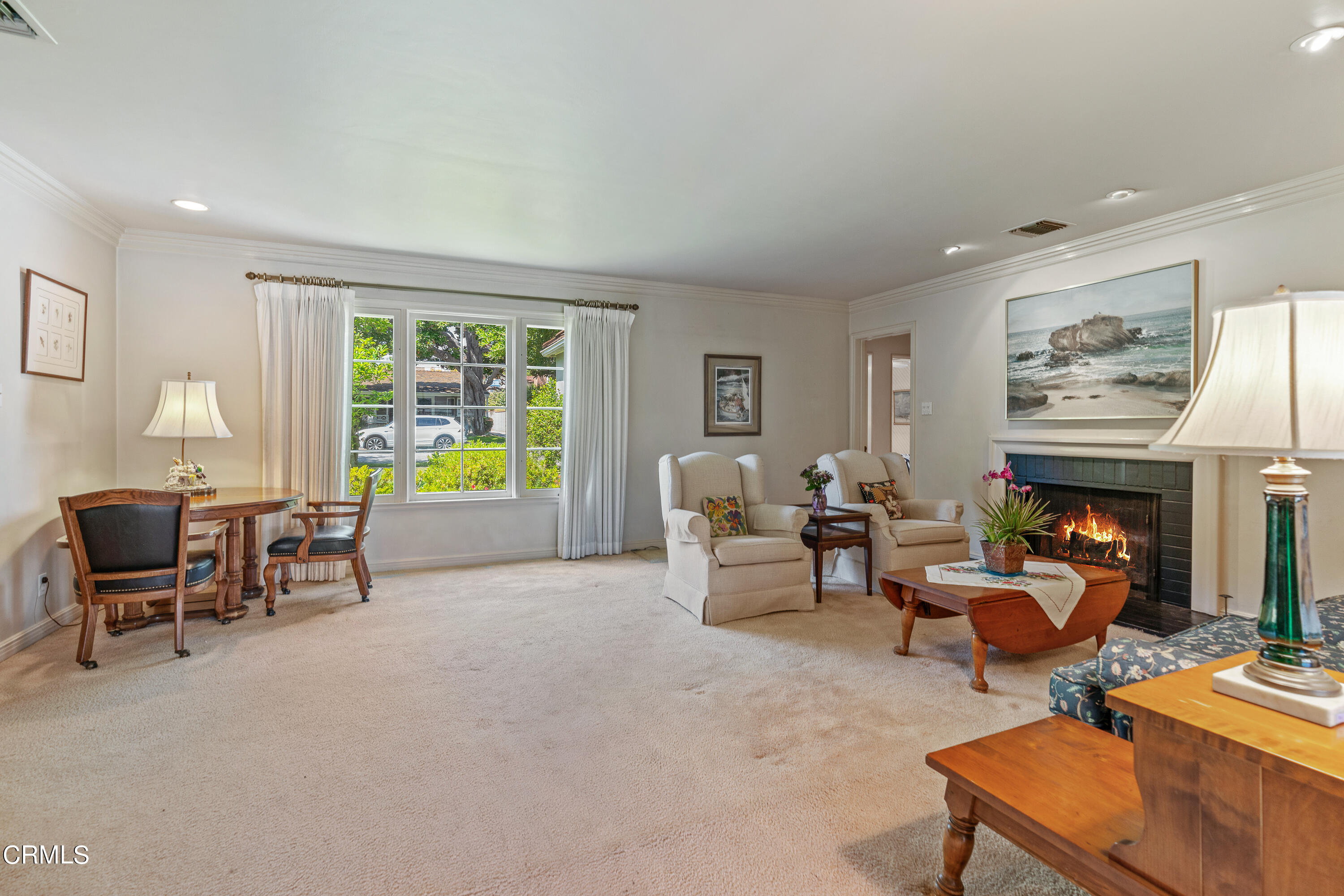 724 Winthrop Road San Marino, CA 91108 - Photo 7 of 37 a living room with furniture and a fireplace