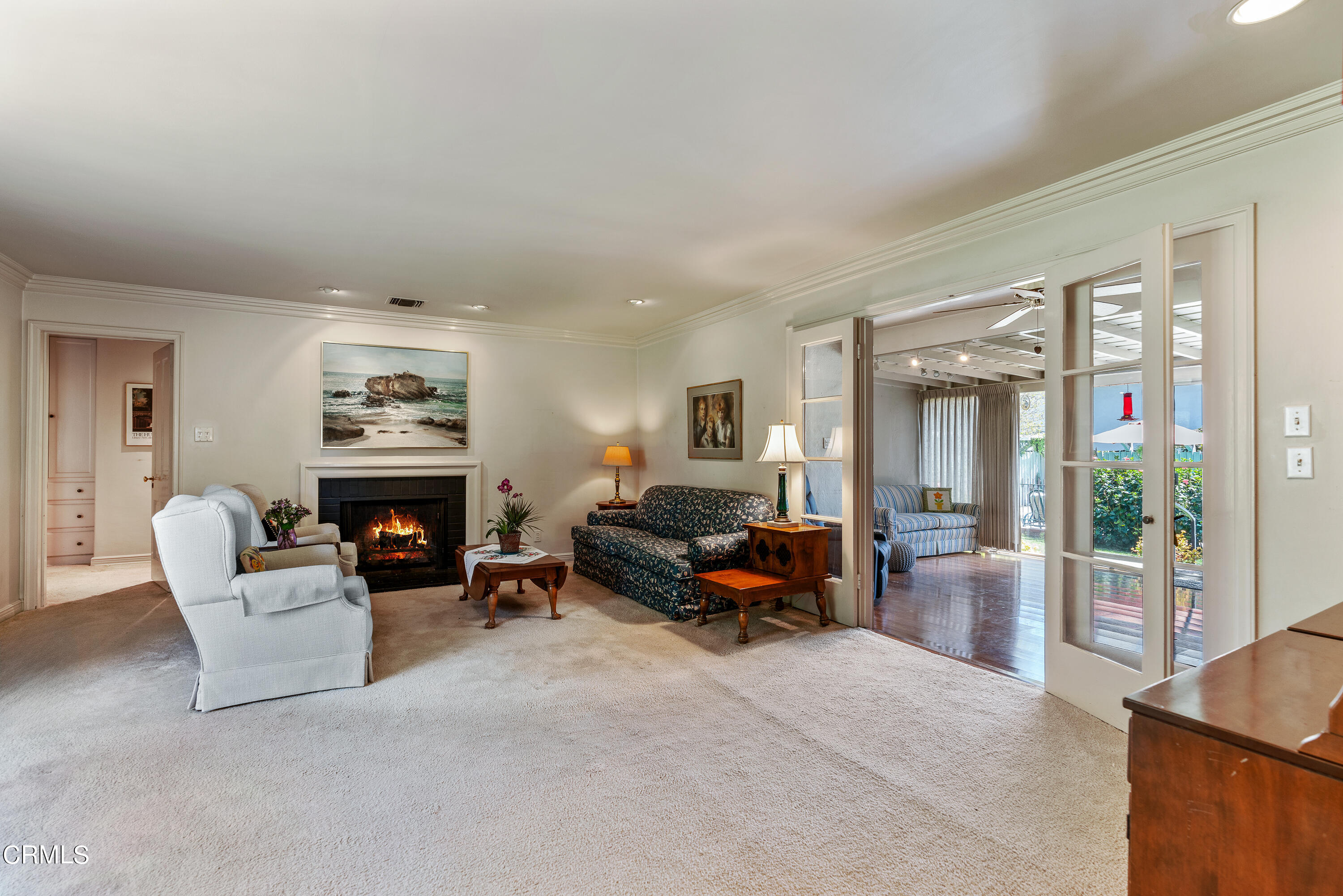 724 Winthrop Road San Marino, CA 91108 - Photo 8 of 37 a living room with furniture and a fireplace