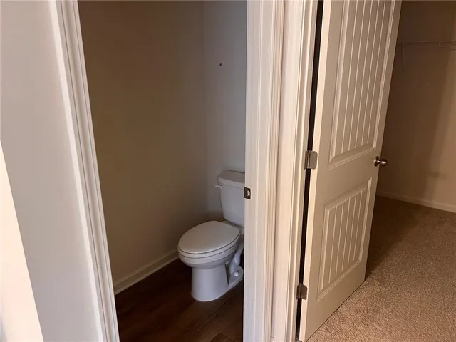 a view of bathroom with a sink and toilet