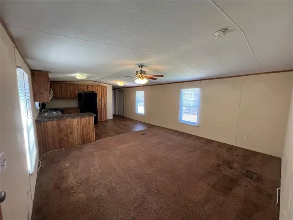 a view of a kitchen with a sink