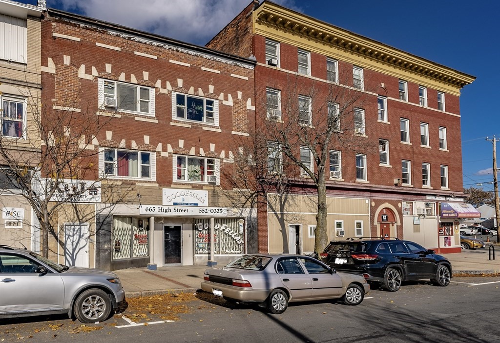 665 High Street Holyoke, MA 01040 - Photo 1 of 2 a car parked in front of a building