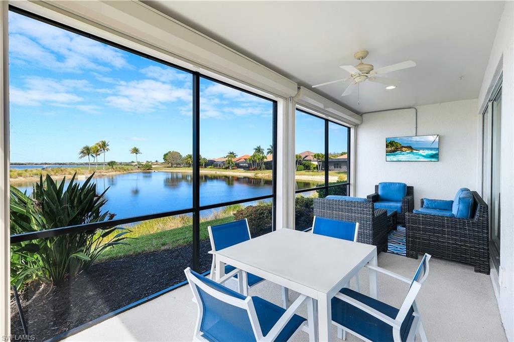 9060 Siesta Bay Drive, Unit 101 Naples, FL 34120 - Photo 3 of 49 a view of a dining room with furniture window and outside view
