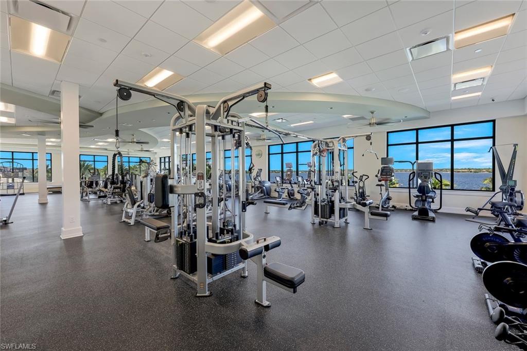9060 Siesta Bay Drive, Unit 101 Naples, FL 34120 - Photo 45 of 49 a view of a room with gym equipment