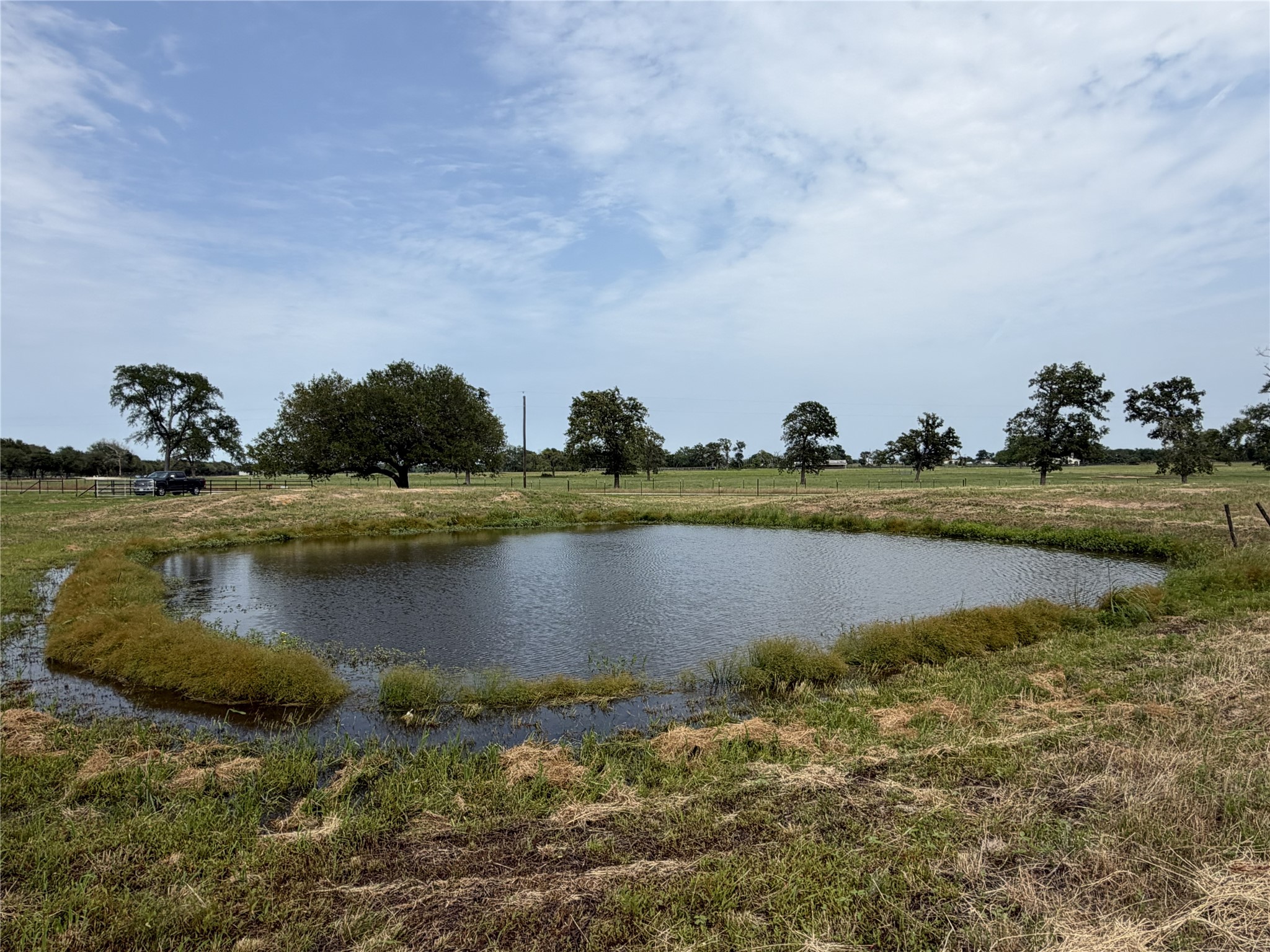38535 Wiggins Road Hempstead, TX 77445 - Photo 11 of 24 a view of a lake with a big yard