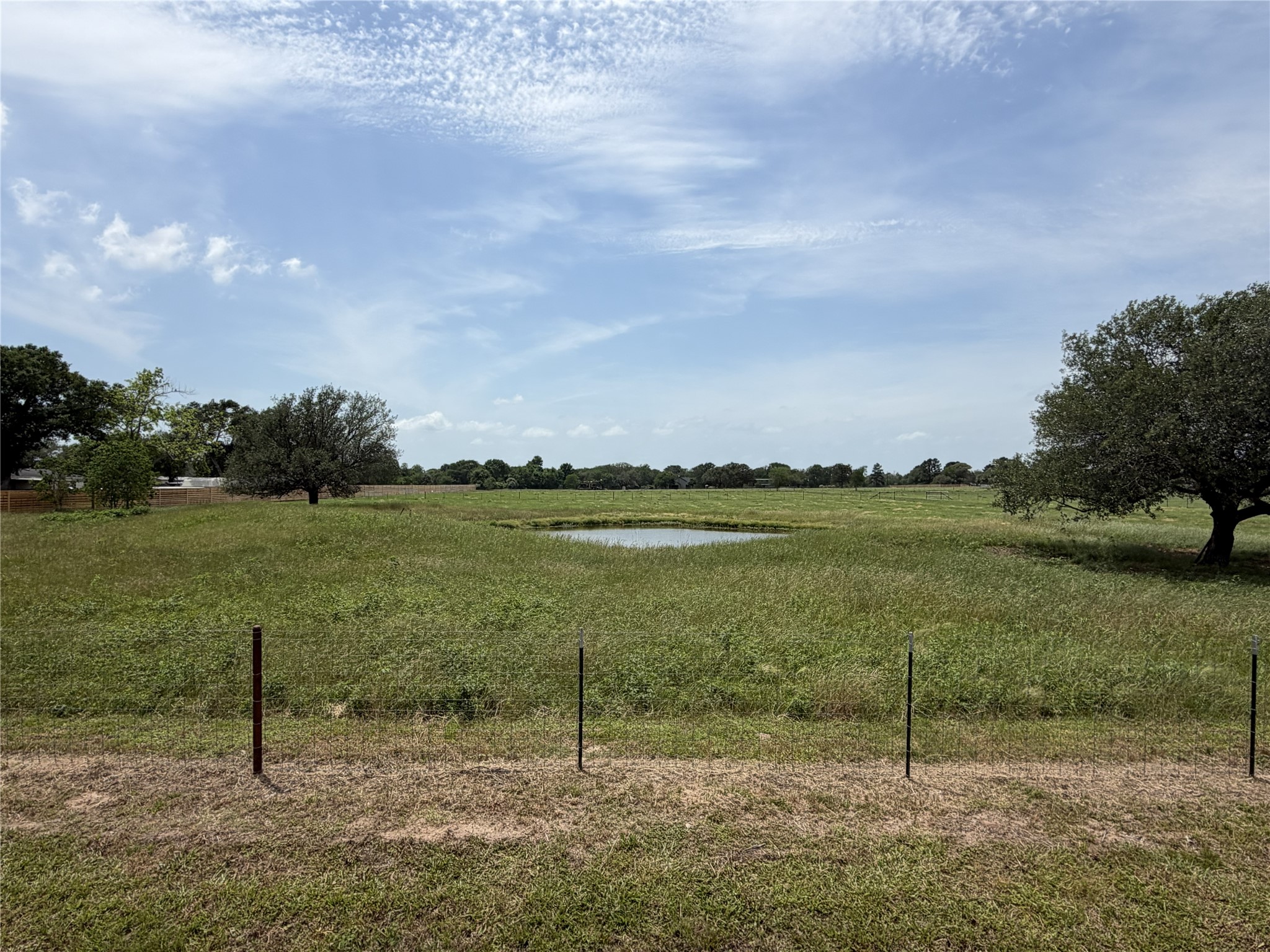 38535 Wiggins Road Hempstead, TX 77445 - Photo 23 of 24 a view of a lake with a big yard