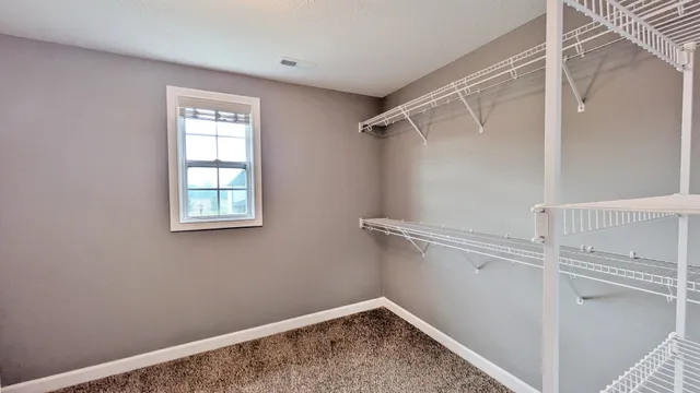 a view of a room with rack on the wall