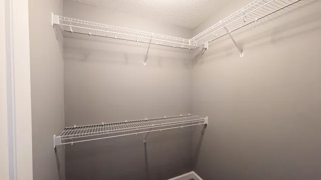 a view of a room with racks on the wall