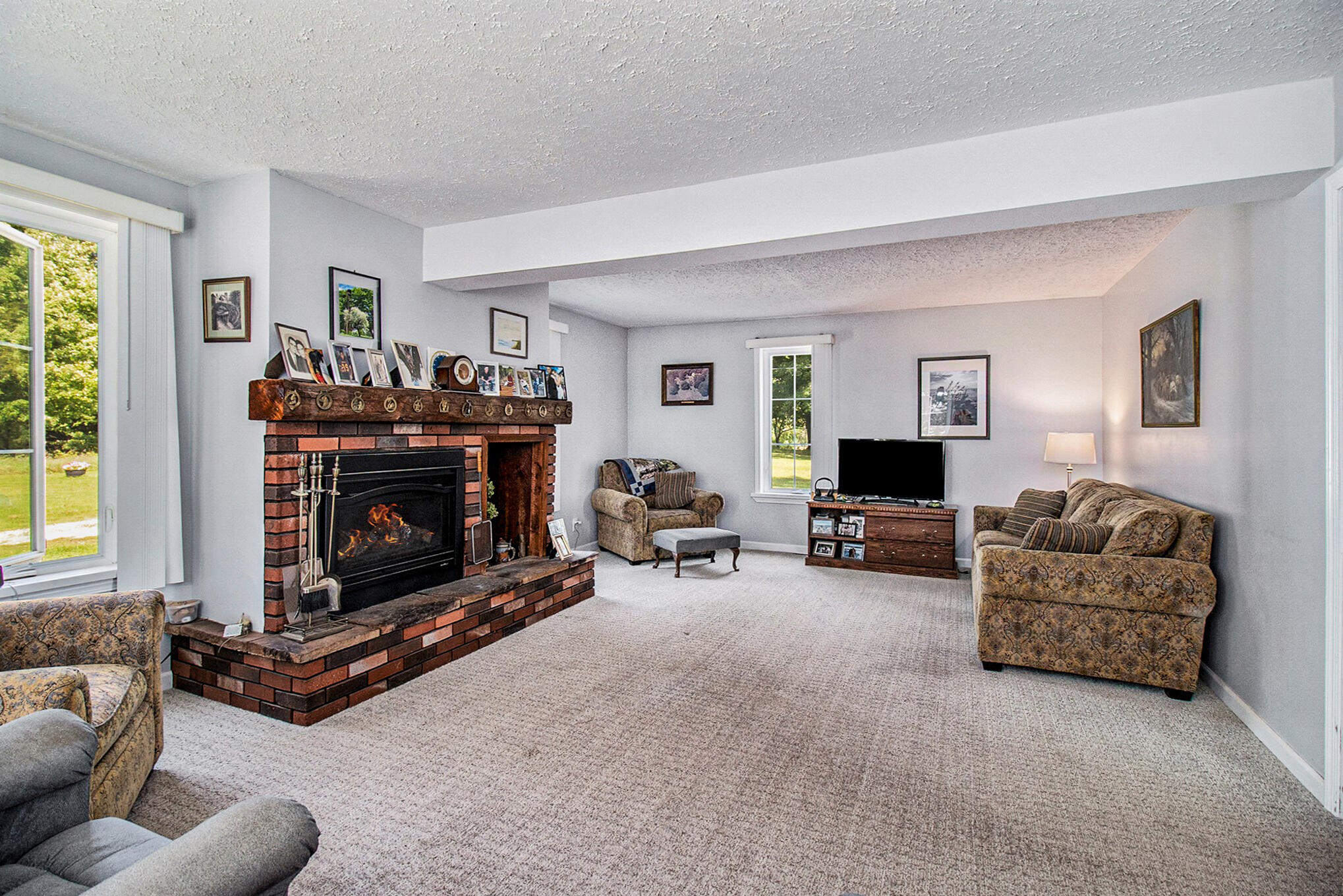 2210 North Stephens Road Custer, MI 49405 - Photo 14 of 42 Living room with fireplace