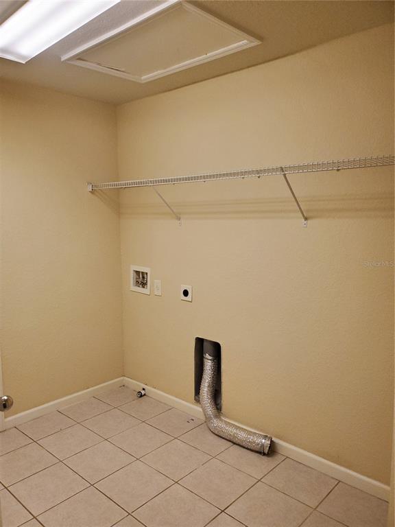 5584 Southwest 39th Street Ocala, FL 34474 - Photo 25 of 56 a view of a garage