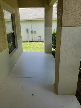 a kitchen with a sink a refrigerator and a stove