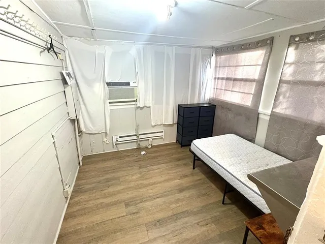 a view of a car park in front of house