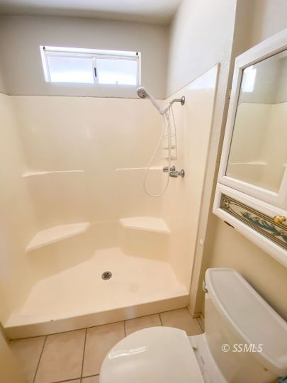 516 West Wasp Avenue Ridgecrest, CA 93555 - Photo 17 of 25 a bathroom with a tub and shower