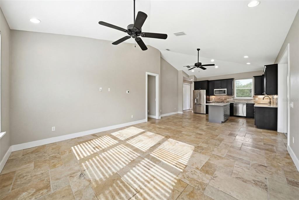 4604 North Fort Christmas Road Christmas, FL 32820 - Photo 17 of 41 a view of a livingroom with a kitchen