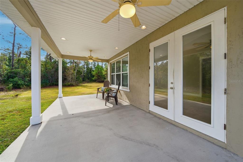 4604 North Fort Christmas Road Christmas, FL 32820 - Photo 30 of 41 a view of a swimming pool with seating space