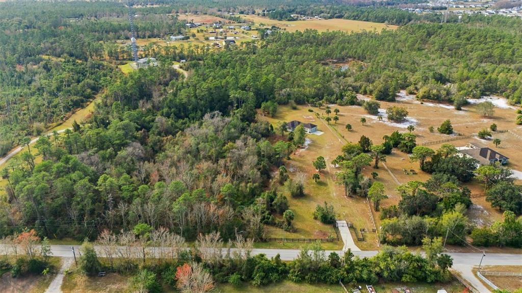 4604 North Fort Christmas Road Christmas, FL 32820 - Photo 36 of 41 an aerial view of a houses with yard