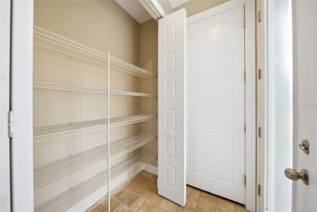 4604 North Fort Christmas Road Christmas, FL 32820 - Photo 9 of 41 a view of a room with wooden floor