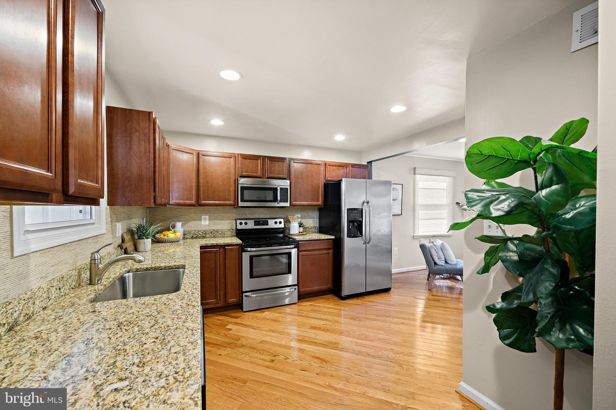 813 Templecliff Road Pikesville, MD 21208 - Photo 3 of 25 Gourmet Kitchen w/ Stainless Steel Appliances