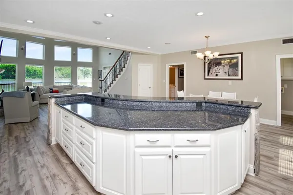 a kitchen with granite countertop a sink and a granite counter tops