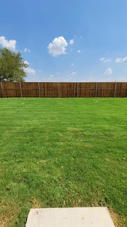 a view of yard with seating space