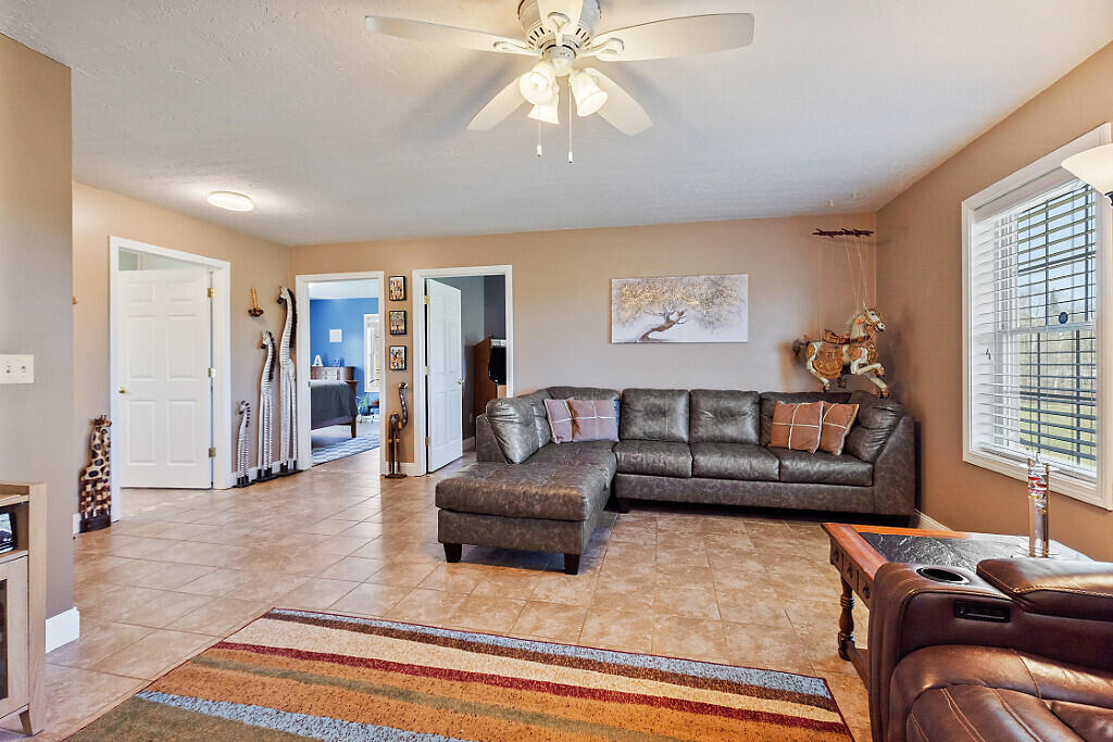 1391 Albion Road Winslow, ME 04901 - Photo 13 of 39 Living room towards bedrooms