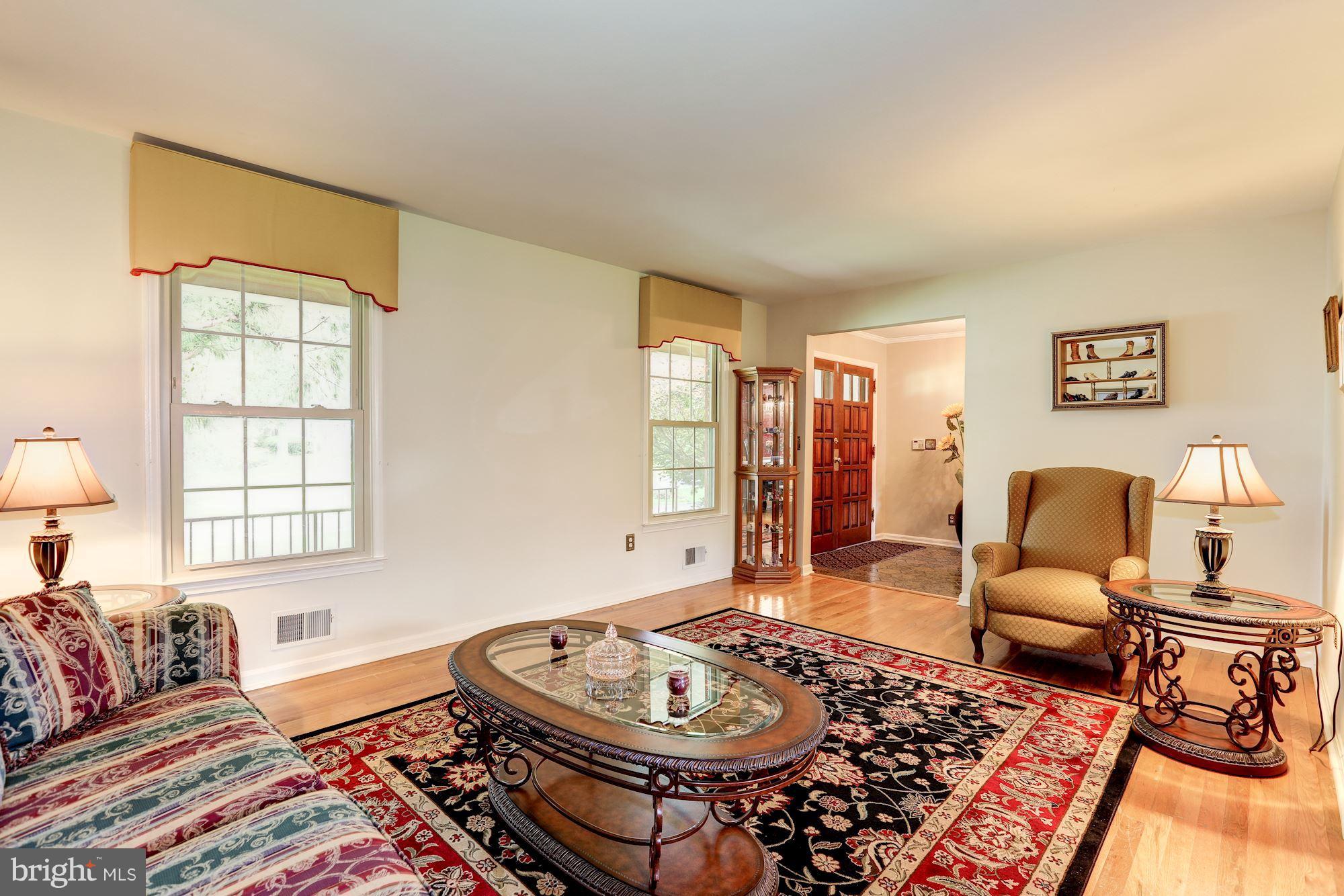 15141 Middlegate Road Silver Spring, MD 20905 - Photo 12 of 30 Living Room overlooks Front Porch and Yard