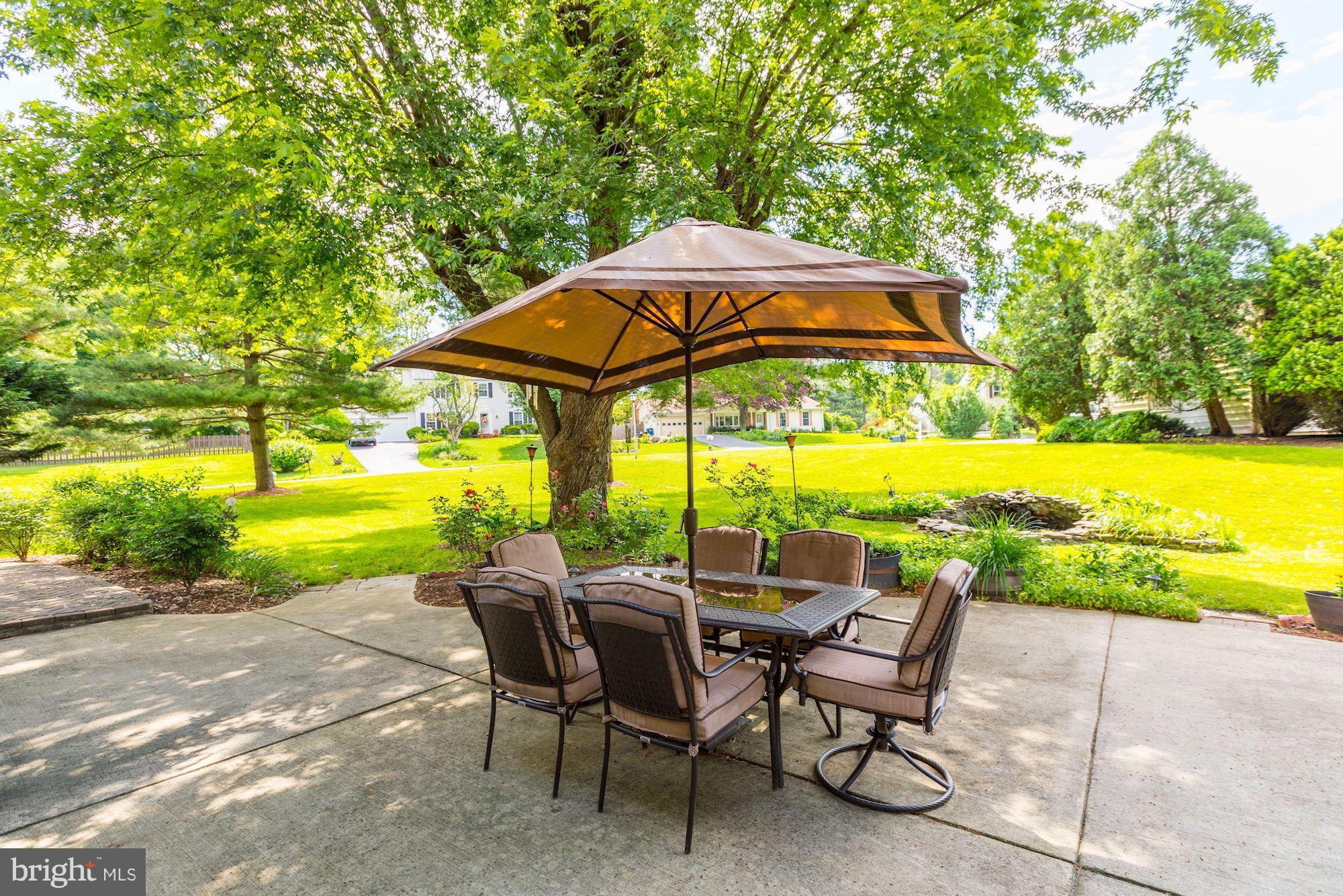 15141 Middlegate Road Silver Spring, MD 20905 - Photo 29 of 30 Patio overlooking large Corner Lot with Fish Pond