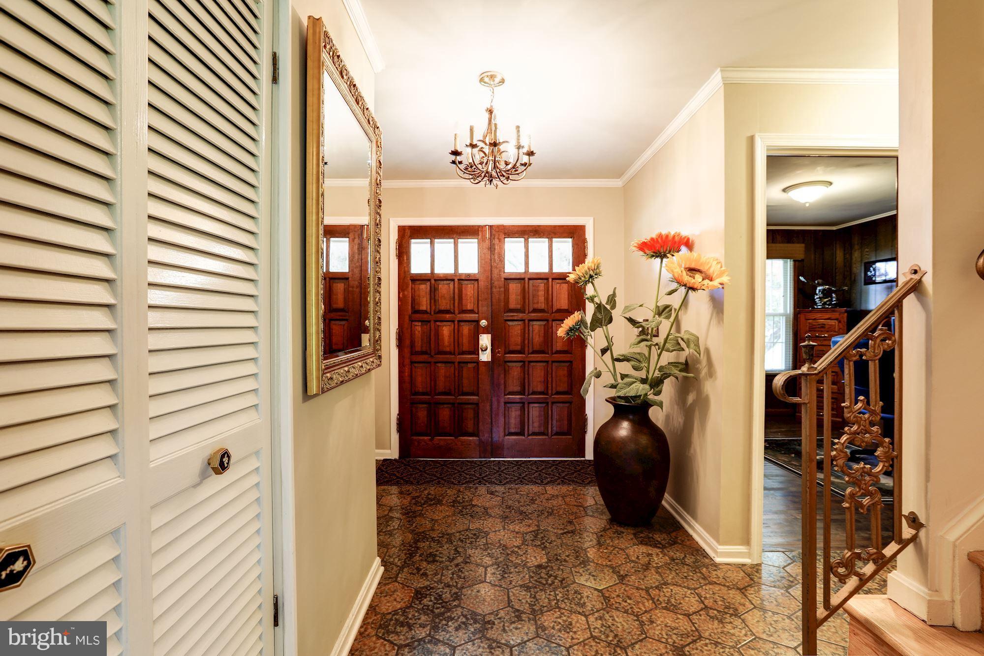 15141 Middlegate Road Silver Spring, MD 20905 - Photo 4 of 30 Elegant Foyer with Double Wood Front Doors