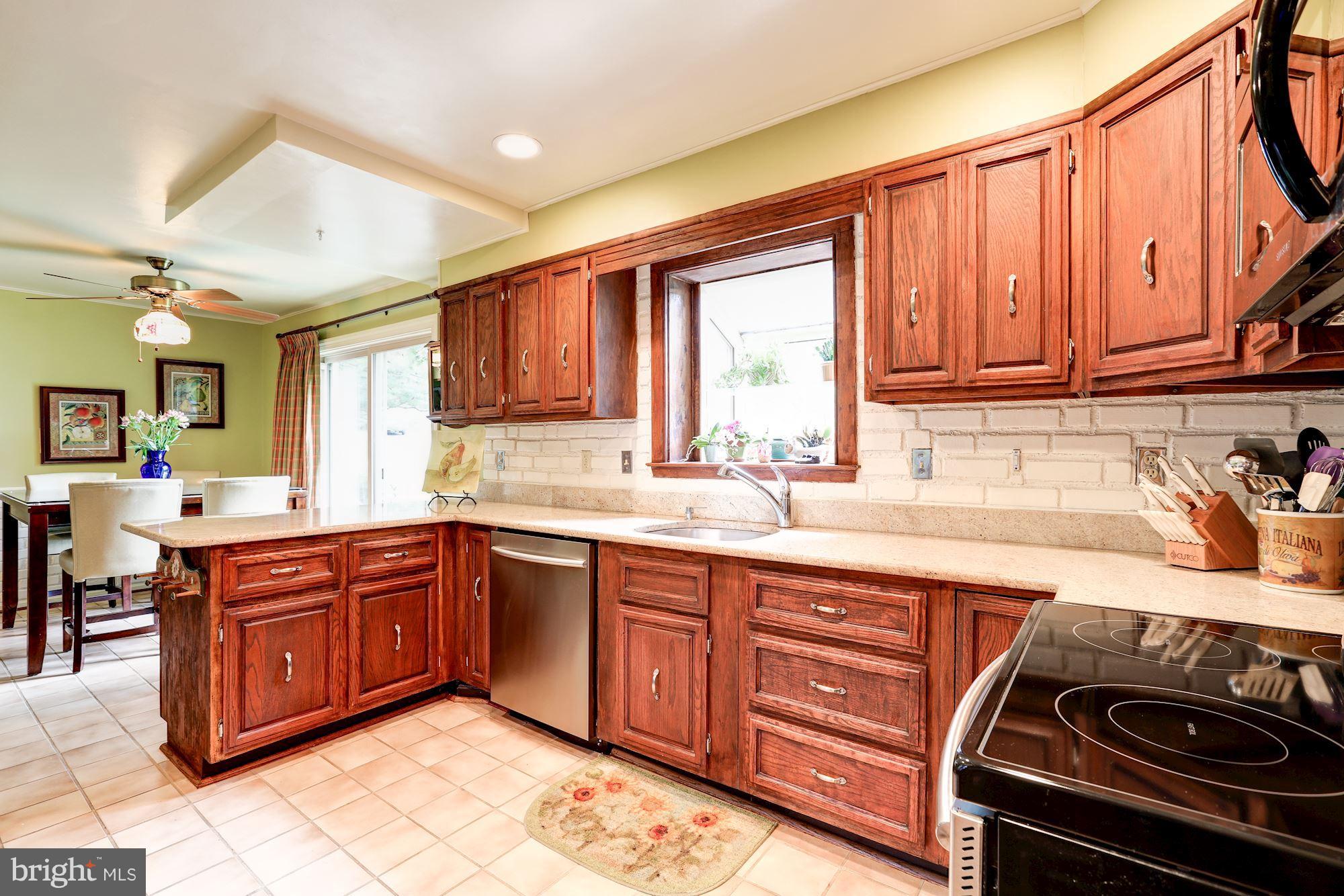 15141 Middlegate Road Silver Spring, MD 20905 - Photo 5 of 30 Spacious Eat-in Kitchen includes Desk and Pantry