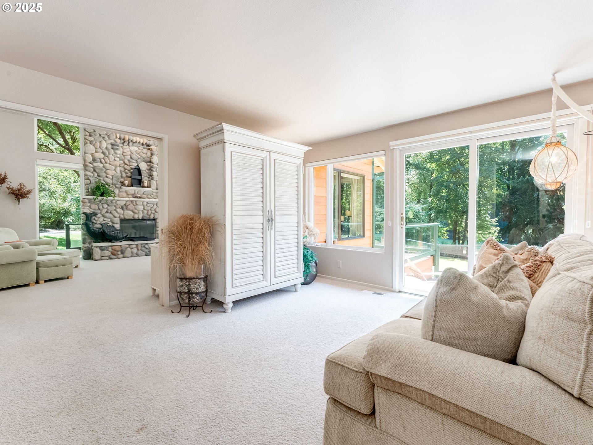 3817 Old Lewis River Road Woodland, WA 98674 - Photo 14 of 48 a living room with furniture and a large window