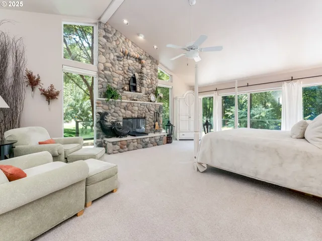 a bed room with a bed and a fireplace