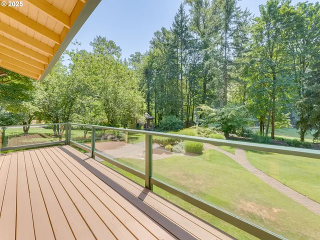 a view of a wooden deck with a patio