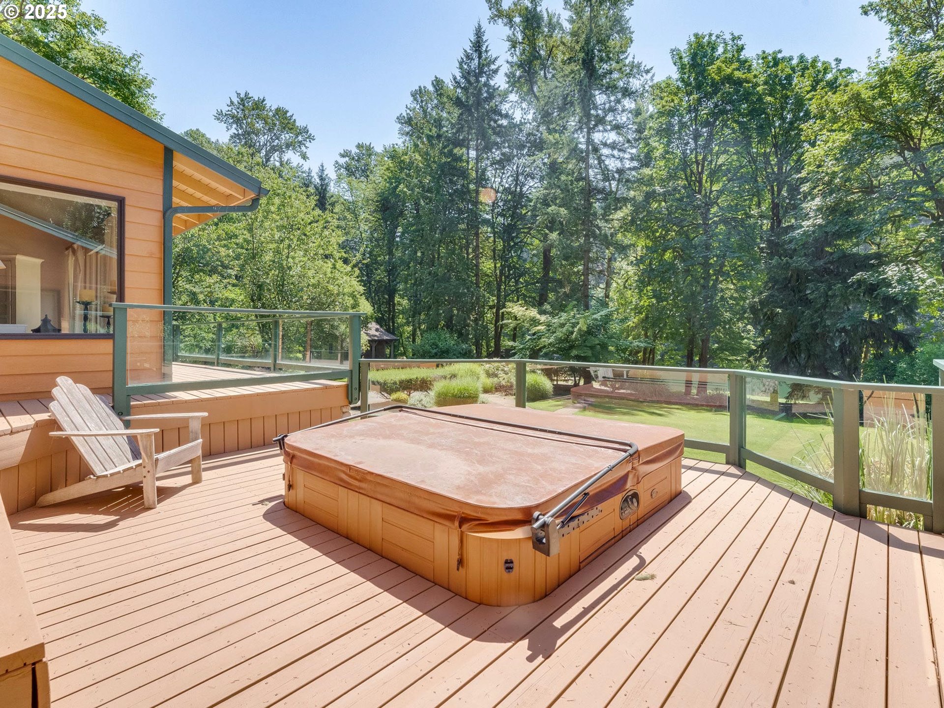 3817 Old Lewis River Road Woodland, WA 98674 - Photo 22 of 48 a view of a wooden deck with a patio