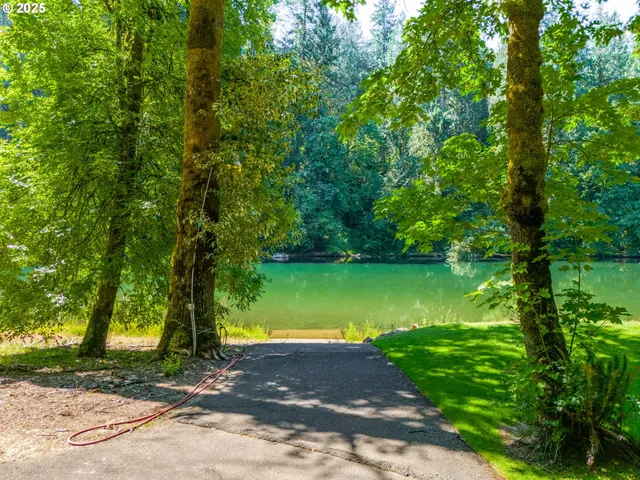 a kitchen with a sink and chandelier