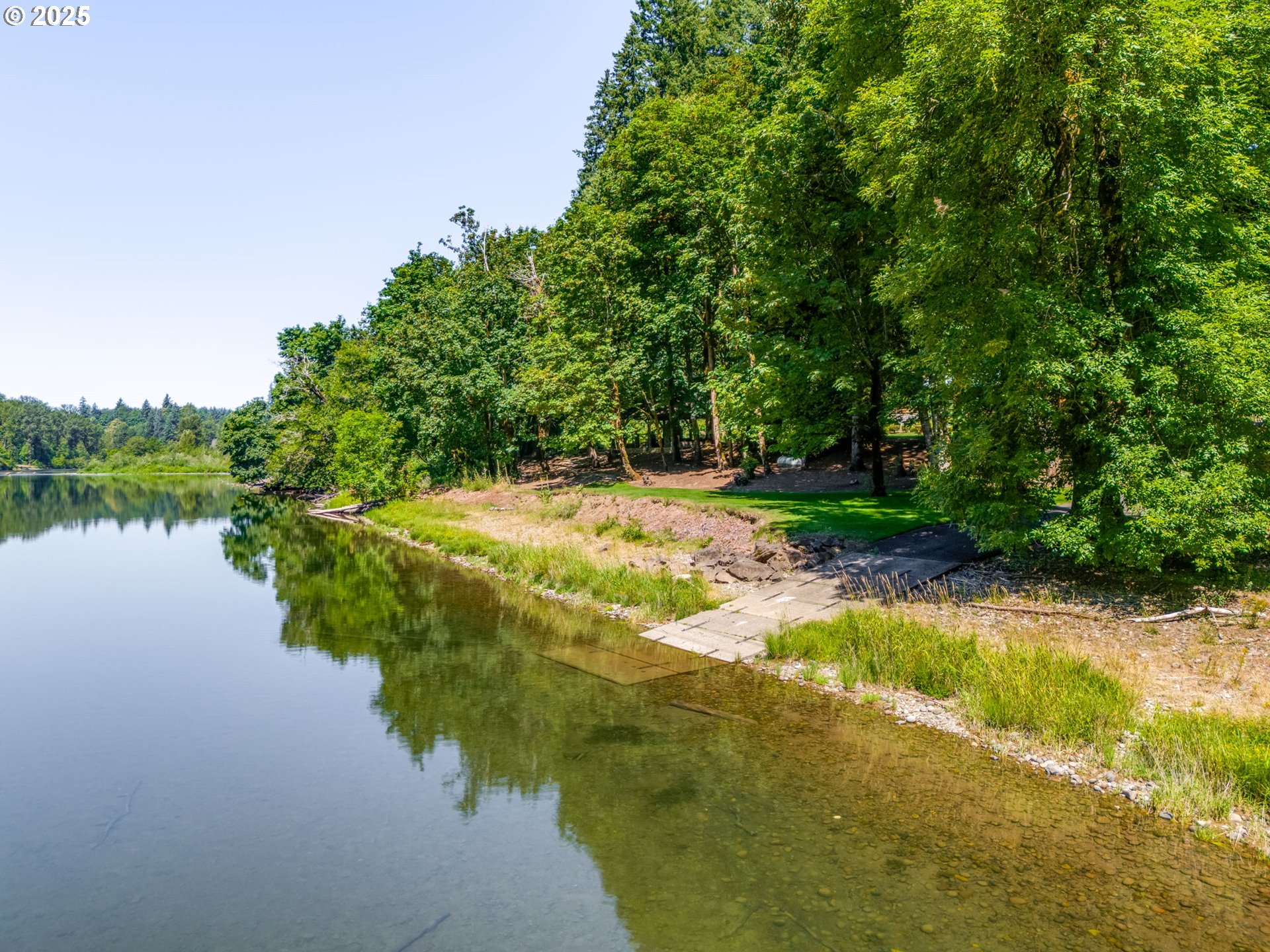 3817 Old Lewis River Road Woodland, WA 98674 - Photo 3 of 48 a view of a lake with houses