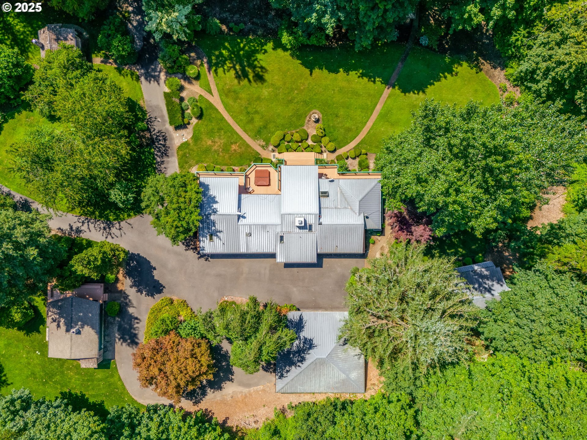 3817 Old Lewis River Road Woodland, WA 98674 - Photo 36 of 48 an aerial view of a house with a yard and lake view