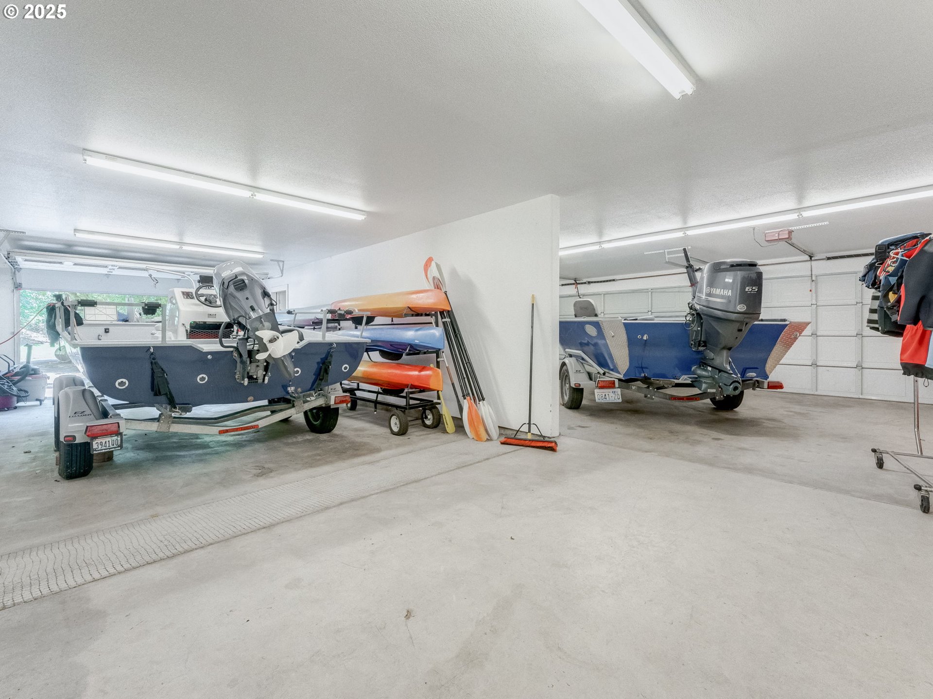3817 Old Lewis River Road Woodland, WA 98674 - Photo 38 of 48 a view of a garage with parked cars
