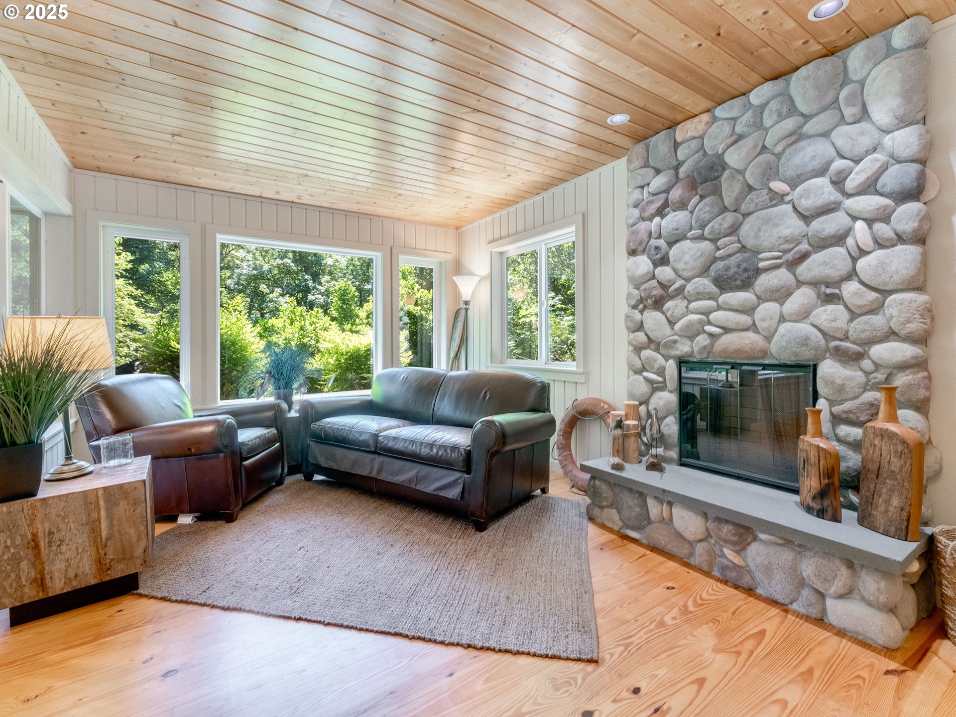3817 Old Lewis River Road Woodland, WA 98674 - Photo 43 of 48 a living room with furniture and a fireplace