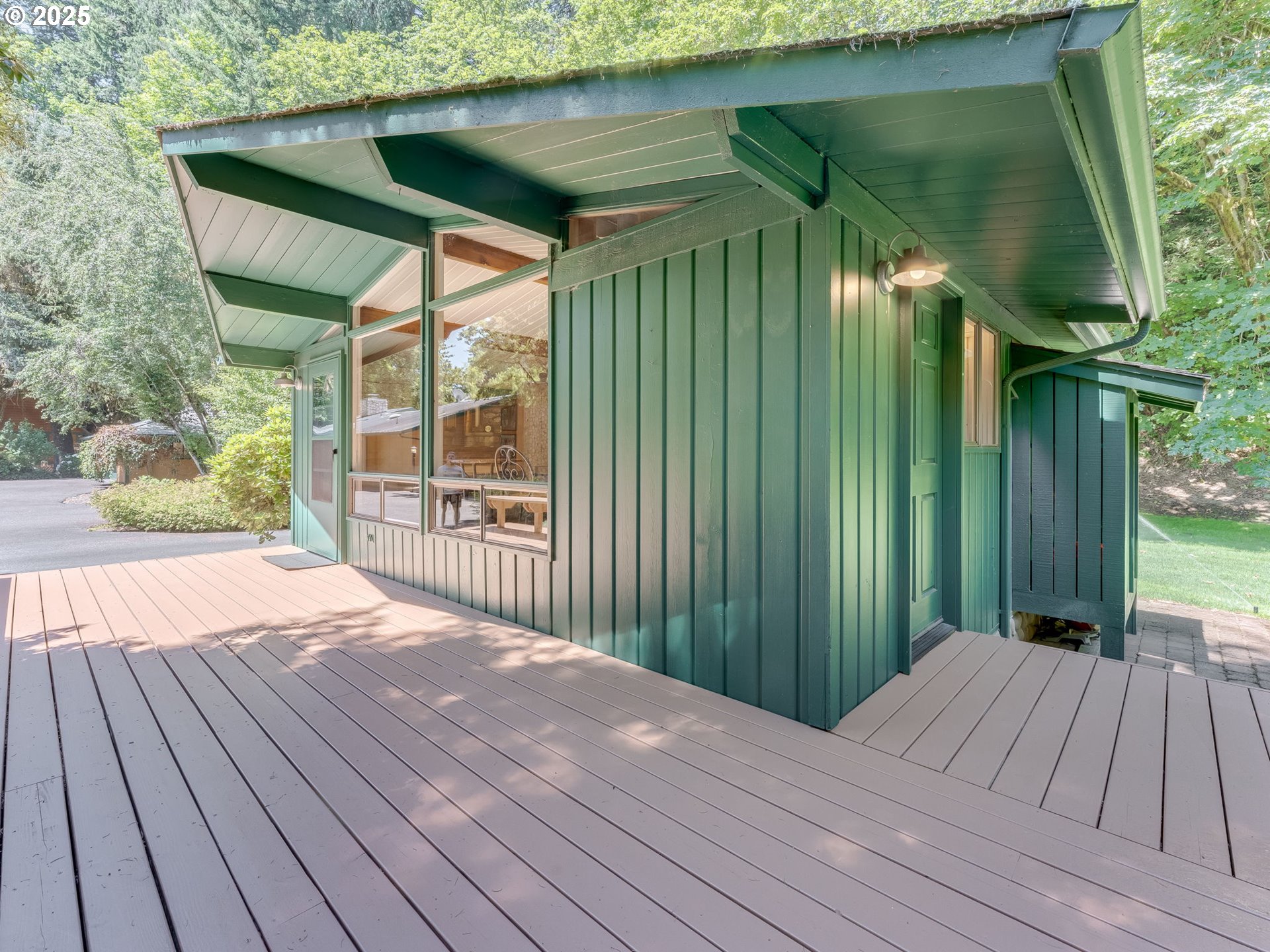 3817 Old Lewis River Road Woodland, WA 98674 - Photo 46 of 48 a view of backyard with a deck and wooden floor