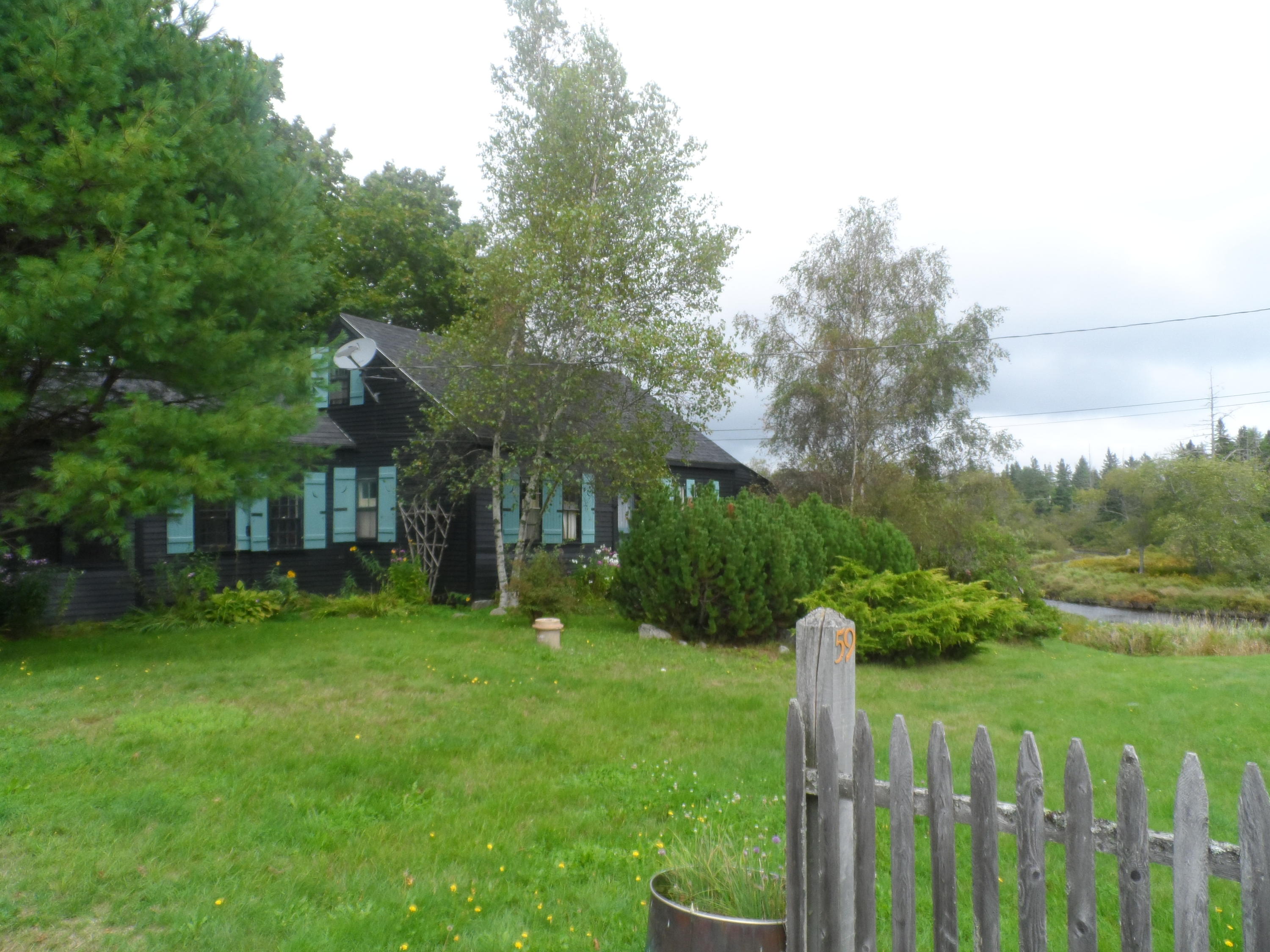 59 Village Road Steuben, ME 04680 - Photo 20 of 24 Front yard from driveway entrance.