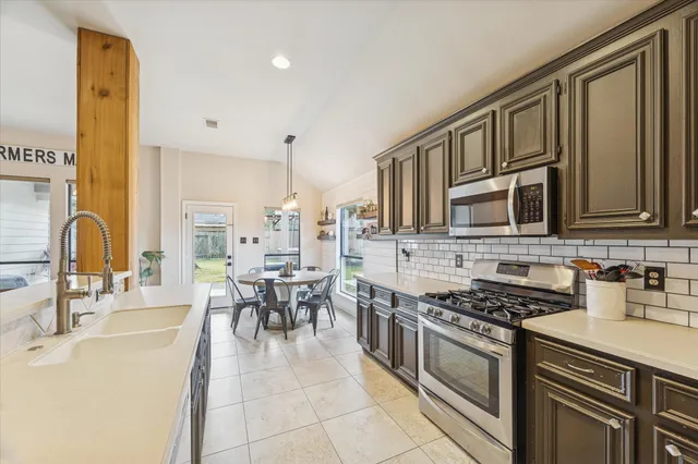 a bathroom with a sink a mirror and a bathtub