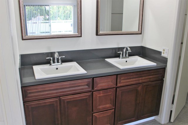 1909 Bardet Place Simi Valley, CA 93065 - Photo 11 of 22 a bathroom with a sink and a mirror