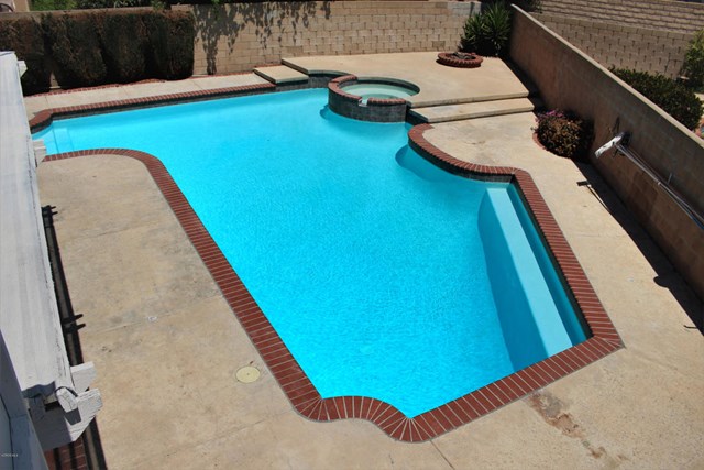 1909 Bardet Place Simi Valley, CA 93065 - Photo 19 of 22 a view of a swimming pool