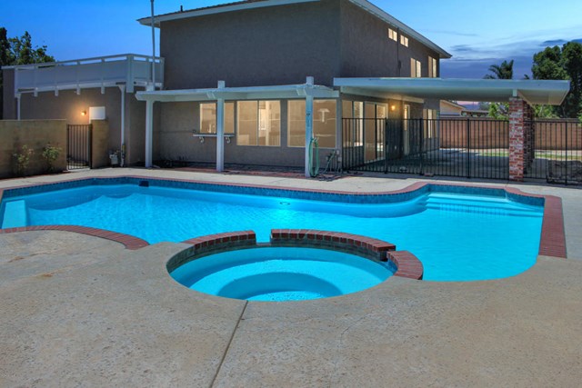 1909 Bardet Place Simi Valley, CA 93065 - Photo 22 of 22 an outdoor space with swimming pool and furniture