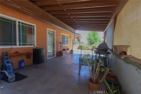 a dining room with furniture window and outside view