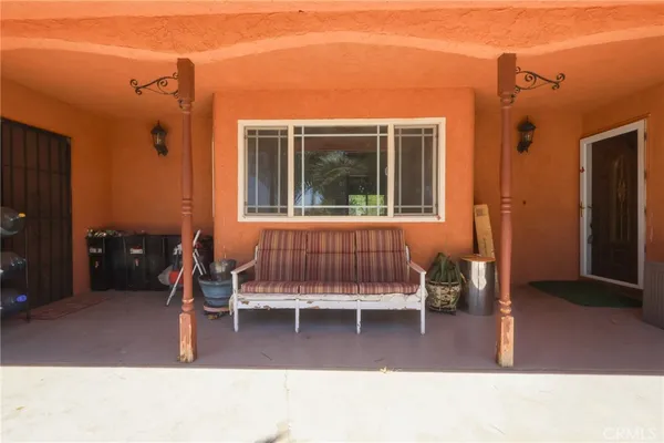 a backyard of a house with seating space