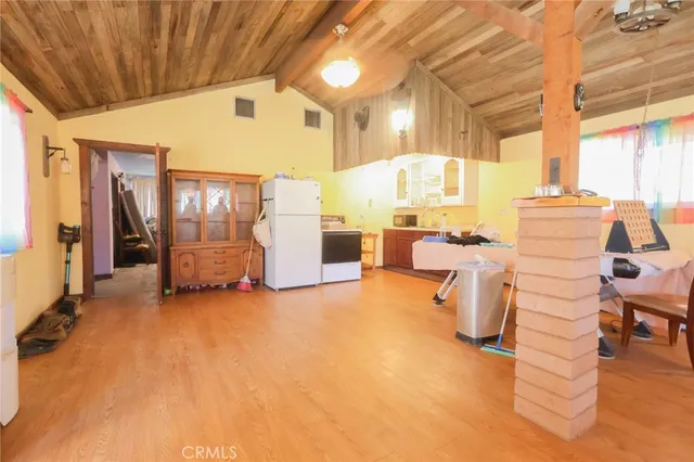 a view of workspace with furniture and window