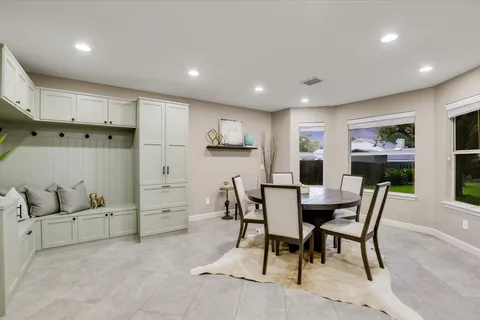 a view of a dining room with furniture