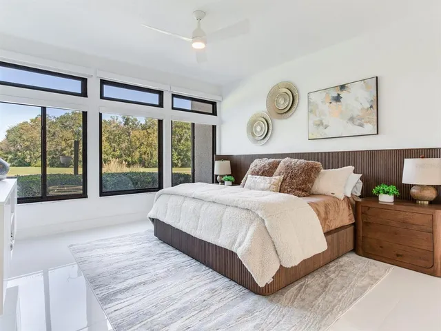 a living room with furniture and white walls