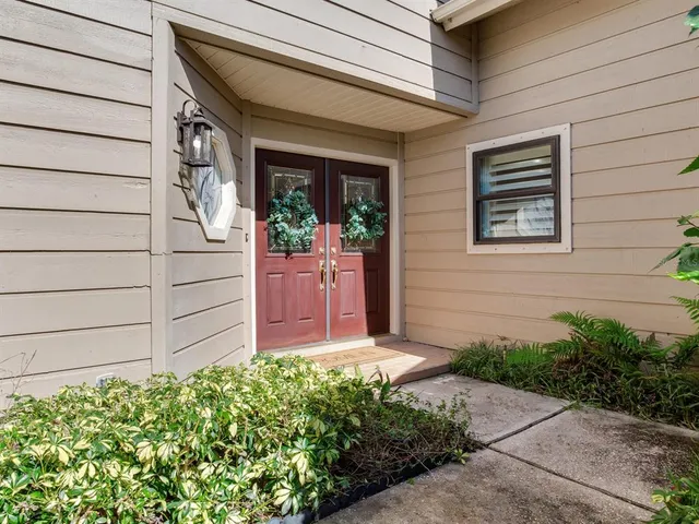 a view of livingroom with furniture and floor to ceiling window